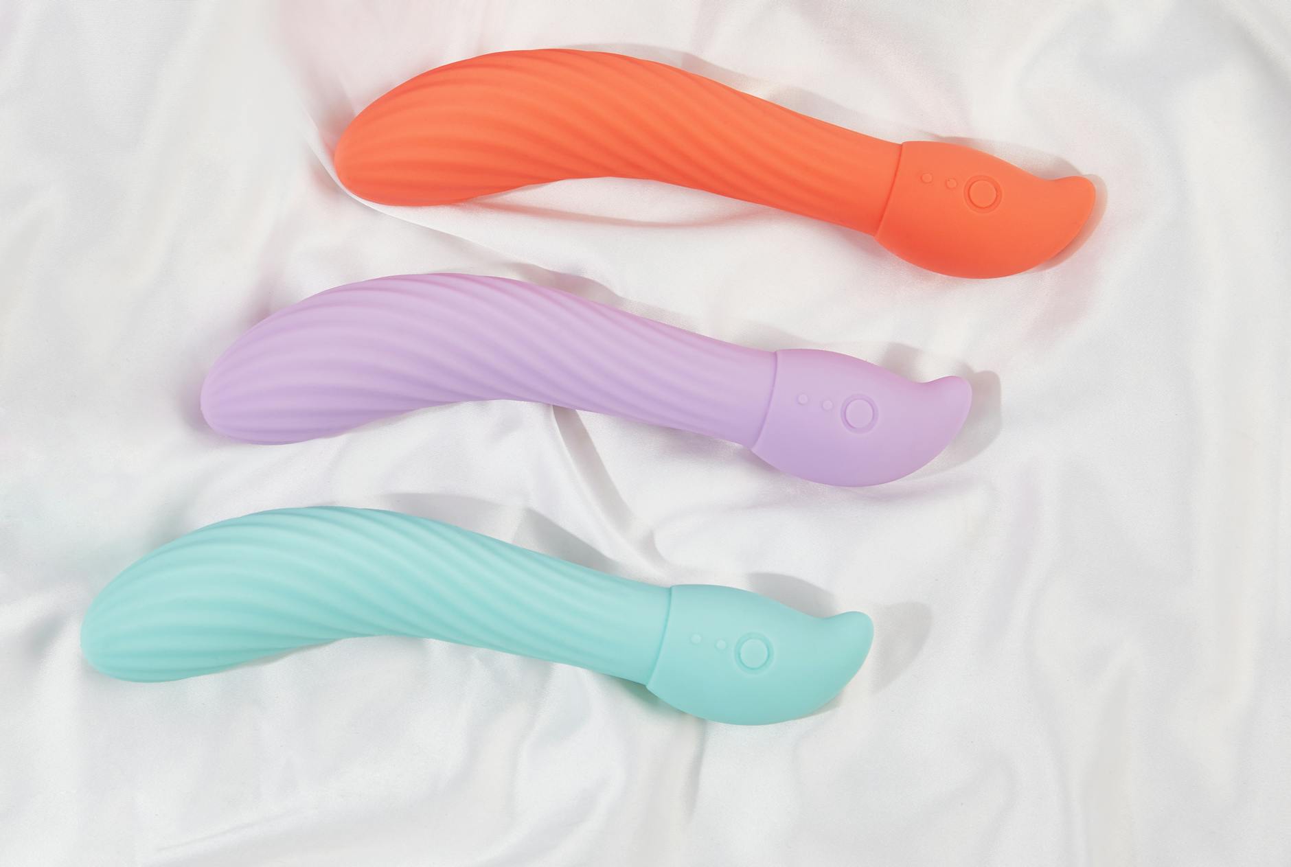 Couple exploring intimacy with a vibrator, representing reconnection and modern relationship tools